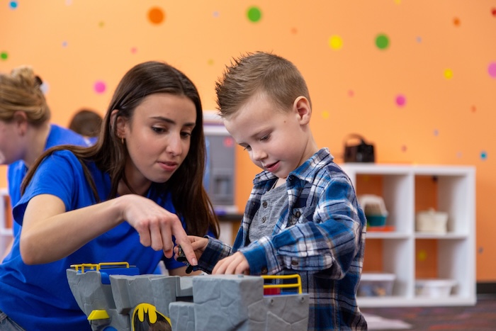 Teacher playing with student